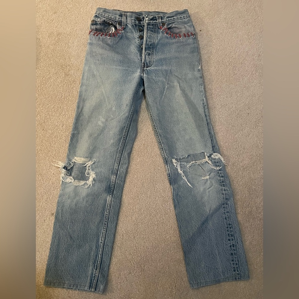 Vintage Levi's Light Blue High-Rise Ripped Jeans with Red Stitching and Patches